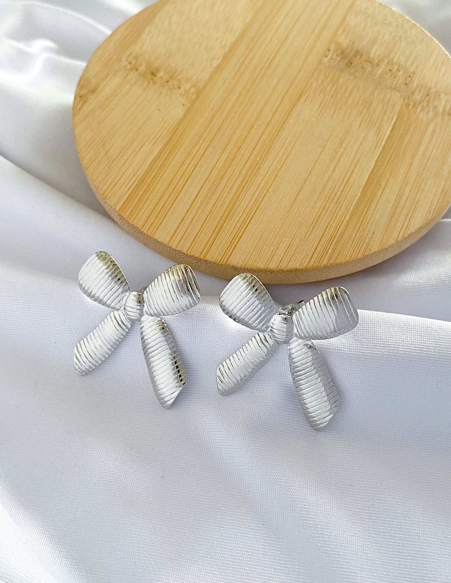 Large Ribbed Bow Earrings - Silver